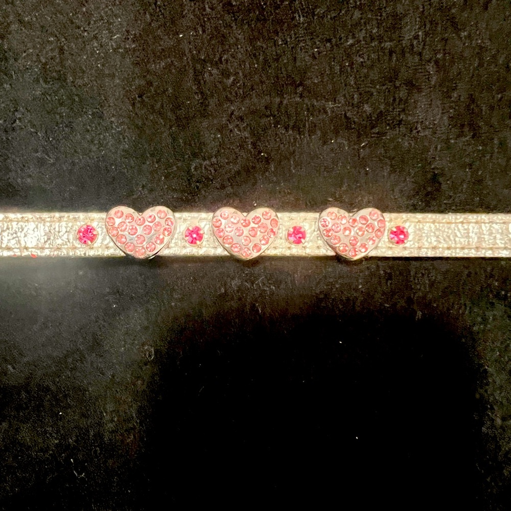 Silver with pink rhinestone hearts 14” dog collar, good condition.